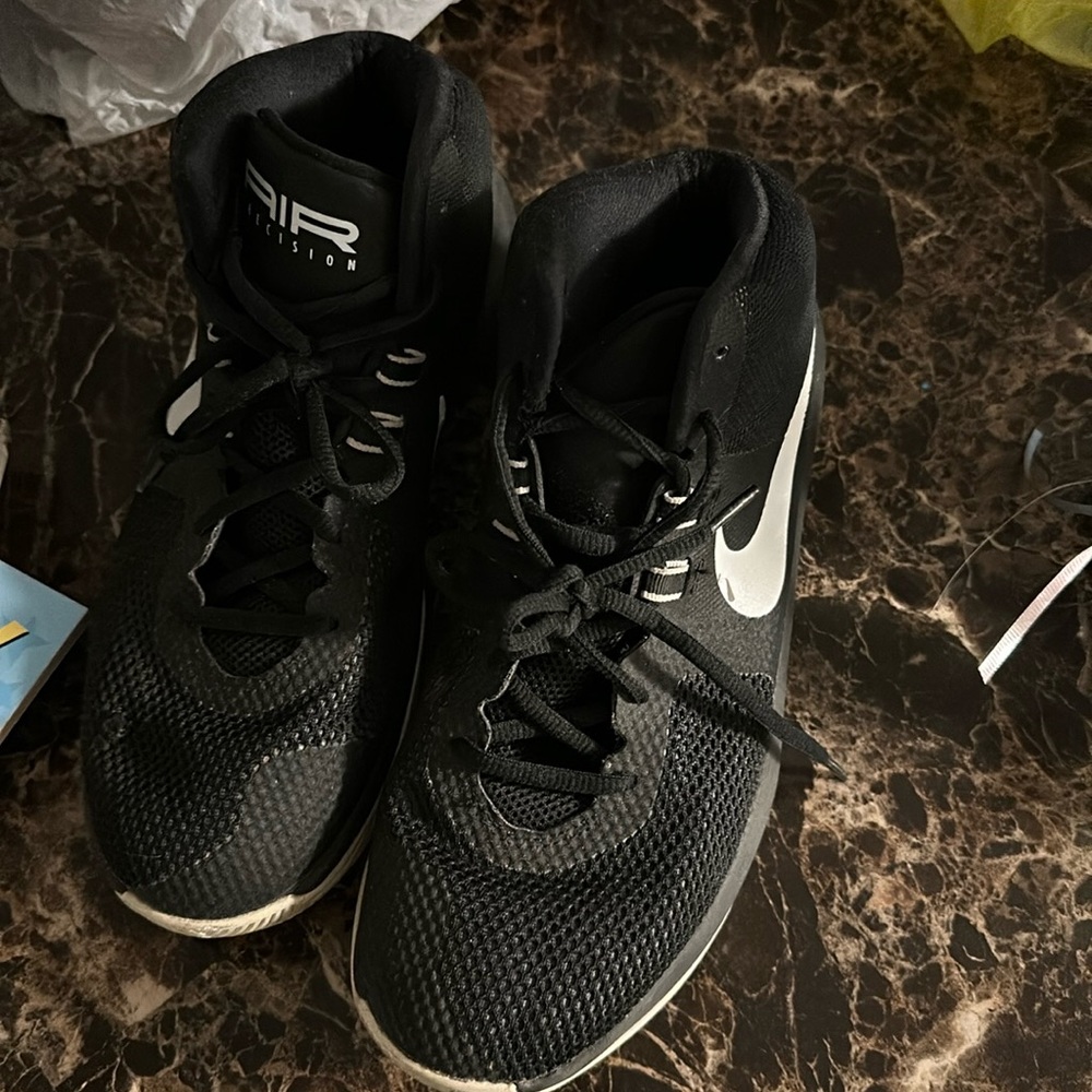 Size 8.5 in men’s air Nike basketball shoes